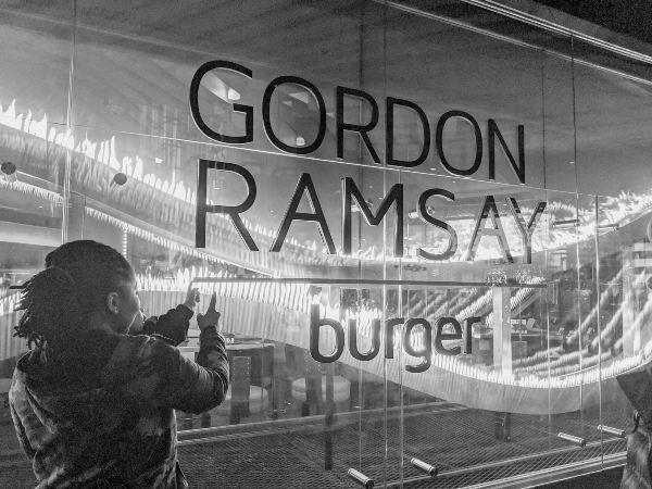 Outside Gordon Ramsey Burger in Las Vegas with a baby